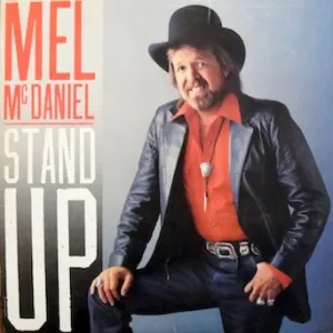 Mel McDaniel / Stand Up Tracks: Stand up / Reminders / Make it with the blues / If you still want a fool around. Thank you Nadine / Worn out shoe & 3 More